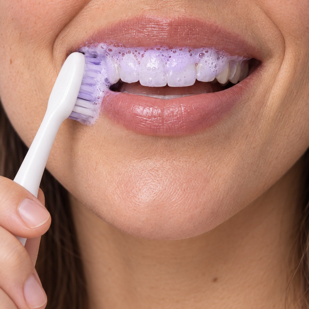 Purple PAP foam on the front teeth